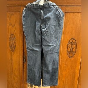 Carhartt cargo jeans. No rips, tears or holes zipper works great. 40x32